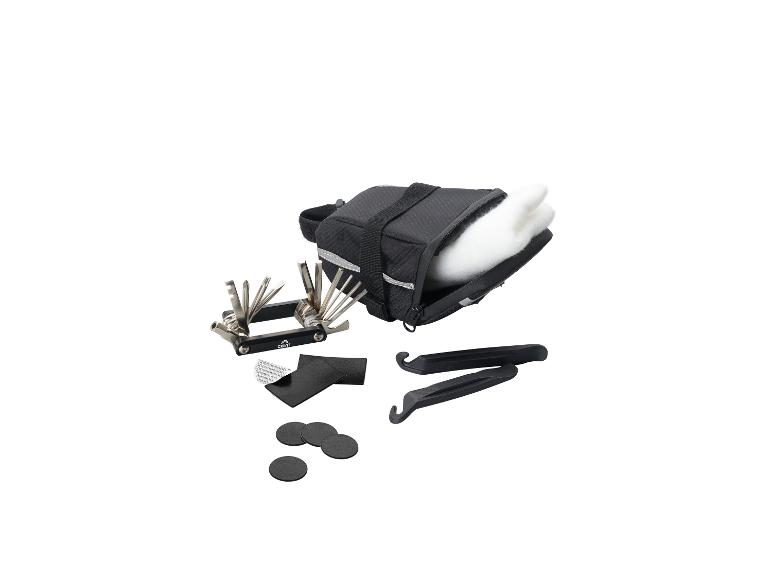 Fietsreparatieset met zadeltas, multitool, bandenlichters en plakset.