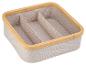 Opbergbox van bamboe en beige stof met compartimenten.