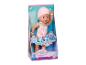 Babypop in een roze zwempak en badmuts, met de tekst 'Lizzie Flamingo Style' op de verpakking.