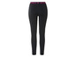 Zwarte leggings met een roze Minnie Mouse-band.