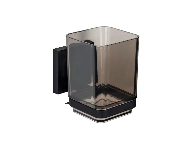Wandbevestiging voor tandenborstels van gerookt plastic met zwarte houder.