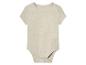 Beige baby romper van mousseline.
