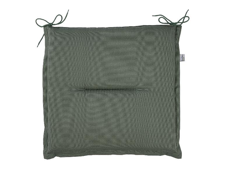 Een groene Livarno Living stoelkussen met strikken.