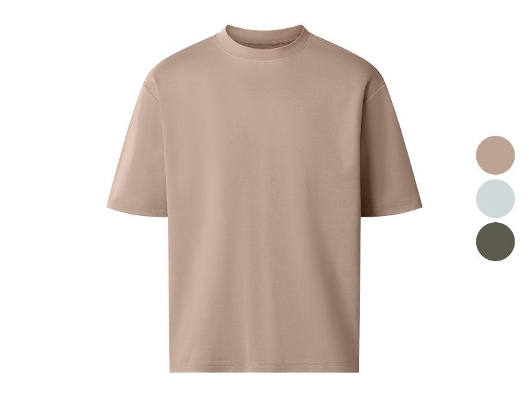 Beige oversized T-shirt met ronde hals, verkrijgbaar in drie kleuren.