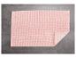 Roze badmat met textuur.
