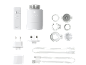 Slimme thermostaatkit met bedieningseenheid, radiatorventiel, stroomadapters en kabels.