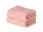 Gestapelde roze handdoeken