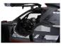 Een zwart Audi model met open deur, zicht op het interieur.