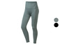 Een paar groene, naadloze leggings voor dames.