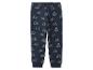 Donkerblauwe kinderjoggingbroek met tractorprint.