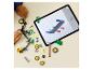 Kind bouwt speelgoed met digitale instructies op een tablet.