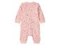 Roze baby jumpsuit met sterrenprint.