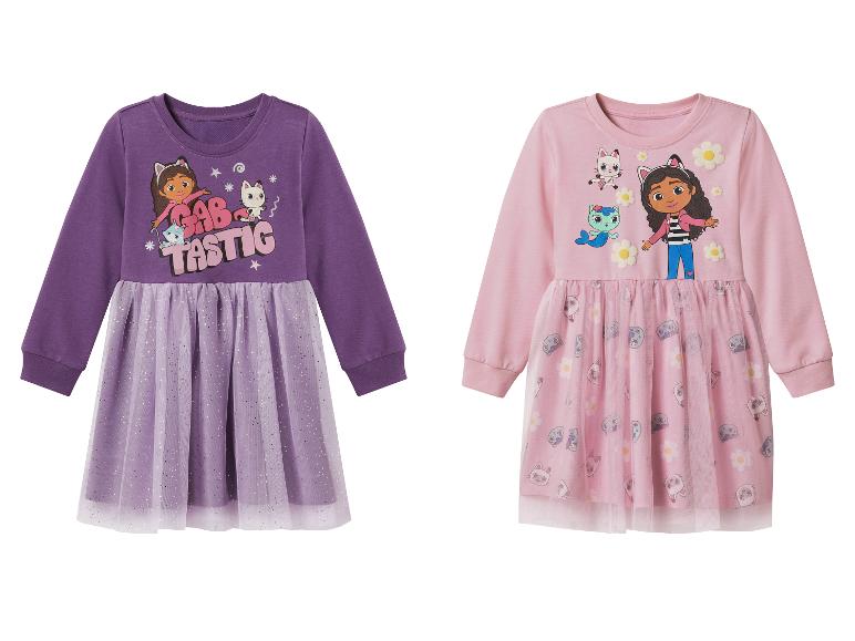 Twee Gabby's Dollhouse-jurken voor meisjes: een paarse en een roze.
