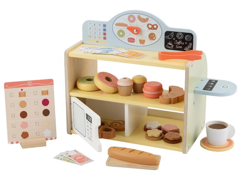 Een houten bakkerij speelset met gebak, geld en een kassa.