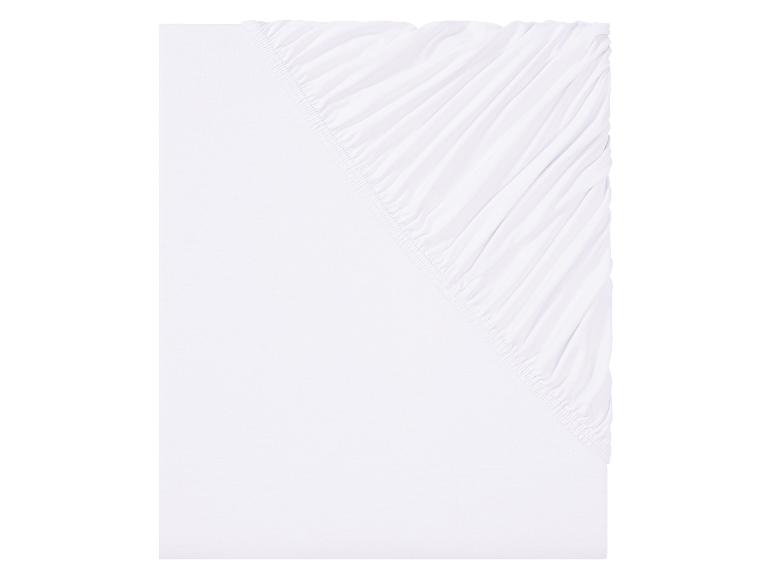 Wit, effen hoeslaken.