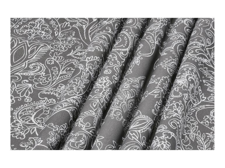 Grijze stof met wit bloemenpatroon, geplooid