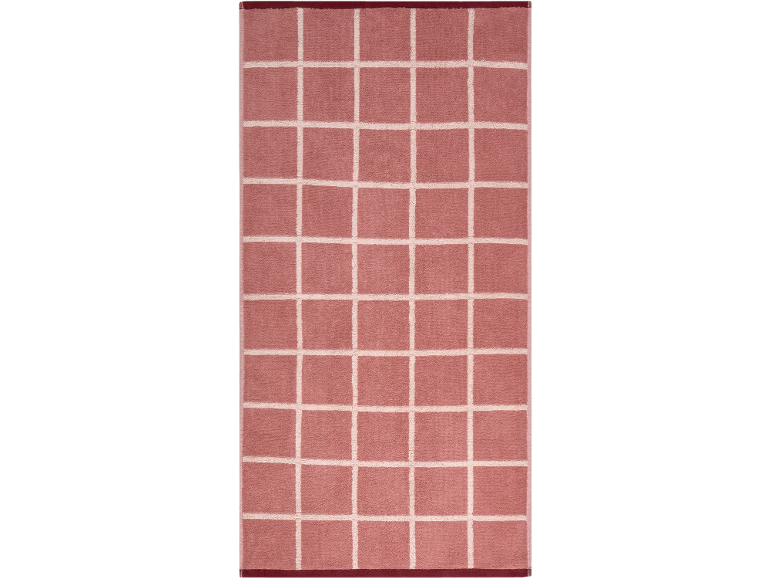 Roze badmat met een wit rasterpatroon