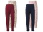 Twee sets kinderleggings: bordeauxrood en crèmekleurig met bloemen, donkerblauw en roze met hartjes.