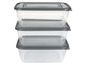Drie stapelbare plastic bewaarbakken met grijze deksels.