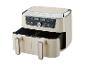 Beige heteluchtfriteuse met twee manden, digitaal display en kookprogramma's.