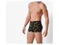 Man draagt zwarte boxershorts met pizzaprint.