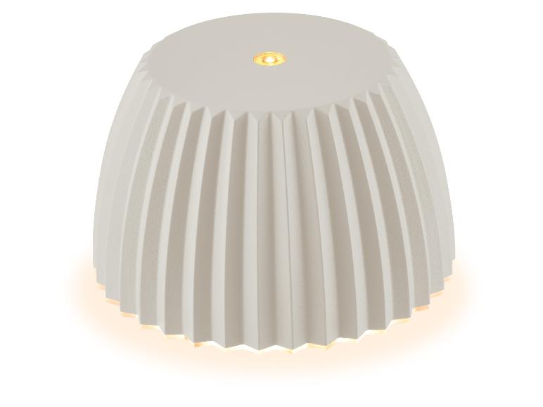 Witte aromadiffuser met geplooid design en warme verlichting