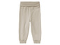 Beige joggingbroek met elastische tailleband.
