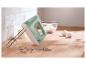 Groene Silvercrest handmixer met kloppers en deeghaken.