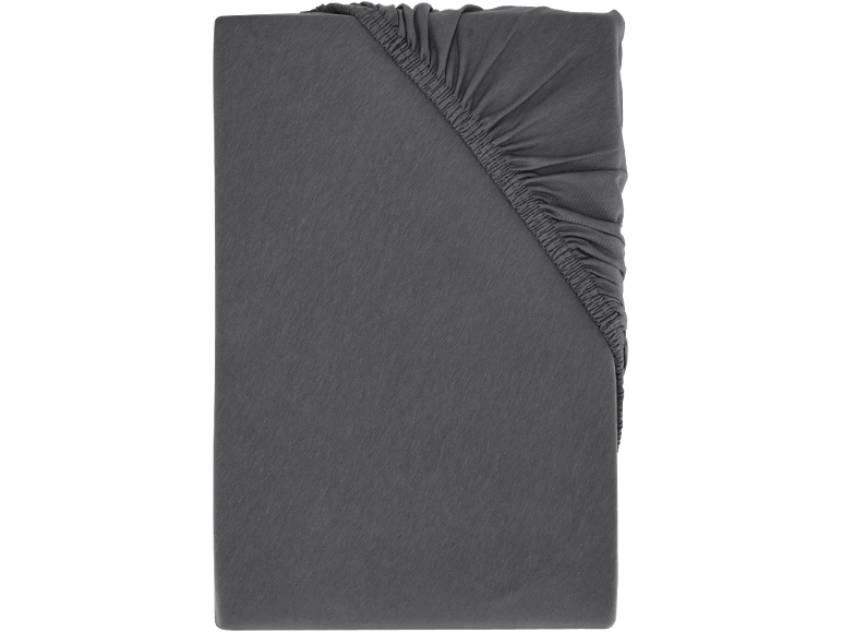 Een donkergrijs hoeslaken is te zien, netjes in een hoek gevouwen.