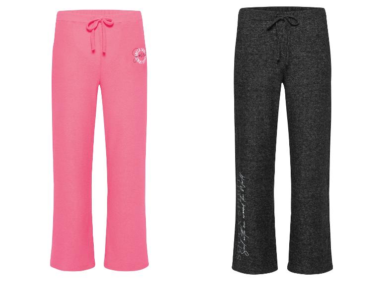 Twee joggingbroeken: één roze en één antracietgrijs.