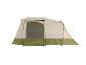 Grote beige en groene kampeertent met open ingang.