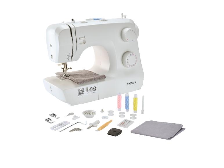Carina naaimachine met accessoires.