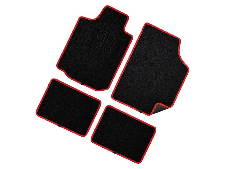 Zwarte automatten met rode randen.