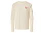 Crèmekleurig sweatshirt met lange mouwen en roze hart op de borst.