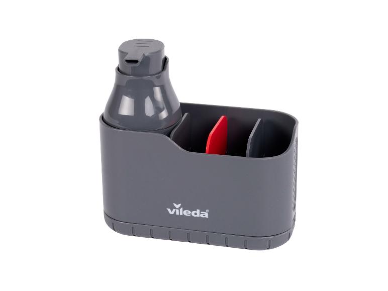 Grijze gootsteenorganizer met zeepdispenser en opbergvakken.