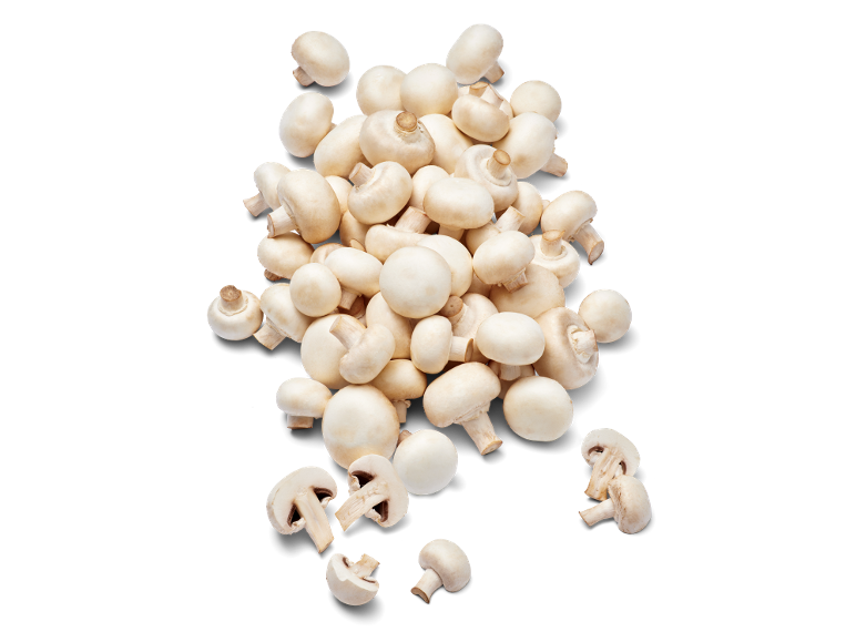 Verse witte champignons Chef Select & You op een zwarte achtergrond.