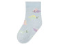 Lichtblauwe sokken met dinosaurussen