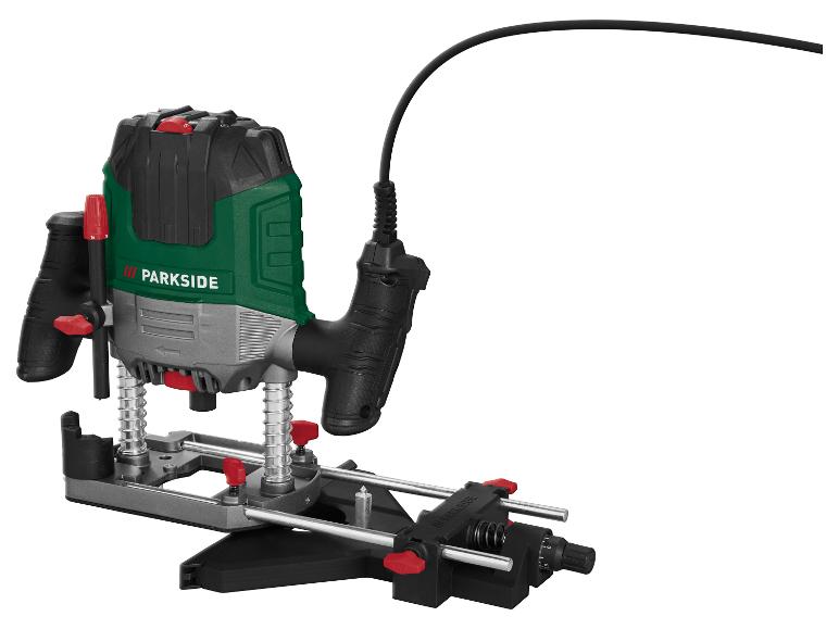 Groene en zwarte elektrische bovenfrees met snoer, op een standaard.