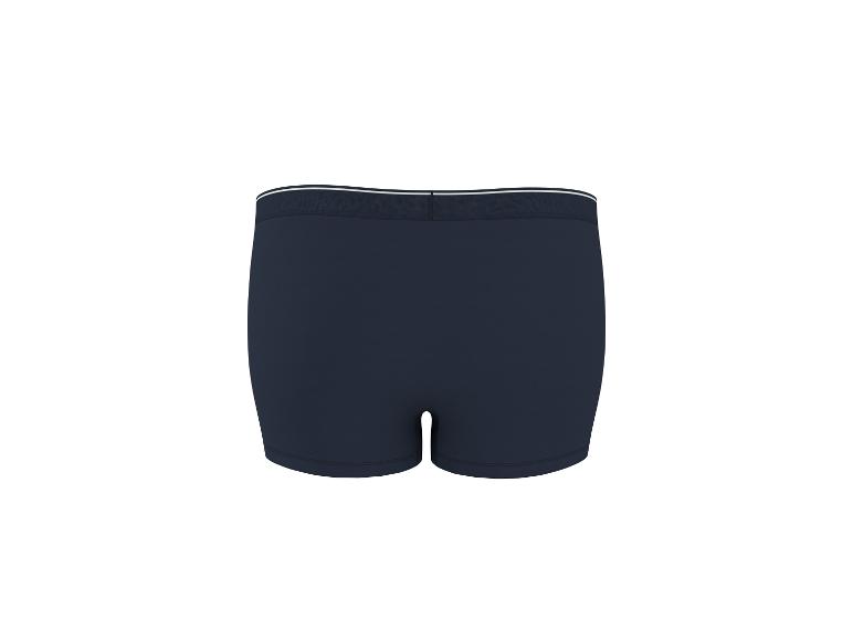 Donkerblauwe boxershort met witte elastische tailleband, achteraanzicht.