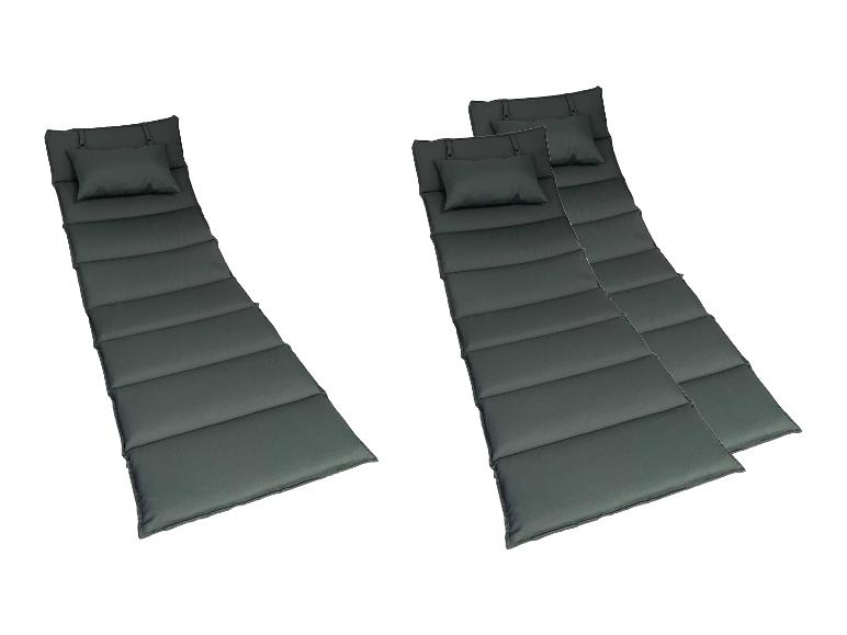 Twee donkergrijze ligstoelkussens met hoofdkussens
