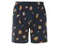 Donkerblauwe pyjama shorts met sinaasappelprint.