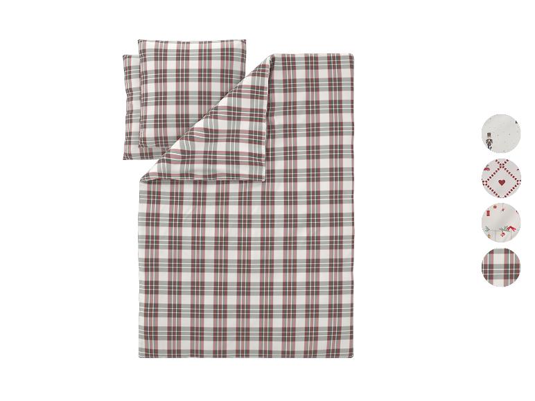Geruit dekbedovertrekset met bijpassende kussenslopen en kerstpatronen.