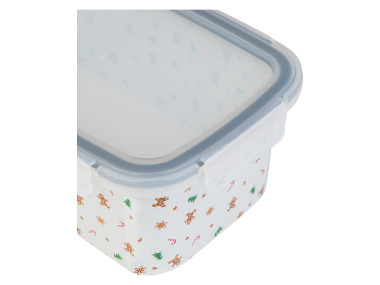 Een doorzichtige, rechthoekige bewaardoos met gingerbread-motief.