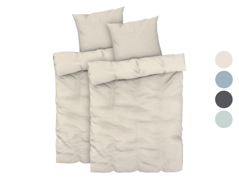 Beige beddengoedset met twee kussenslopen en een dekbedovertrek, verkrijgbaar in andere kleuren.