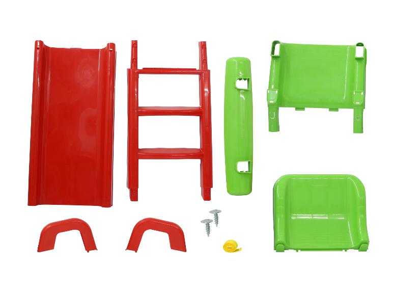 Onderdelen van een rode en groene plastic glijbaan voor kinderen.