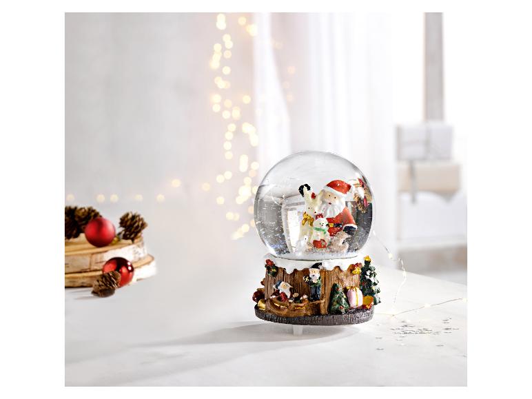 Kerst sneeuwbol met de Kerstman en dieren, feestelijke decoraties