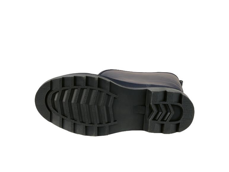 Zool van een donkerblauwe rubberen laars, met het profielpatroon