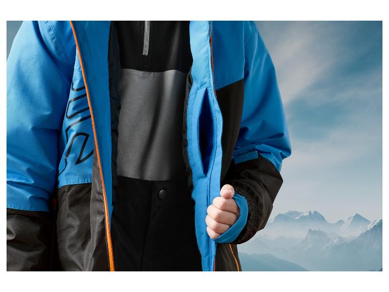 Blauwe skijas met oranje rits