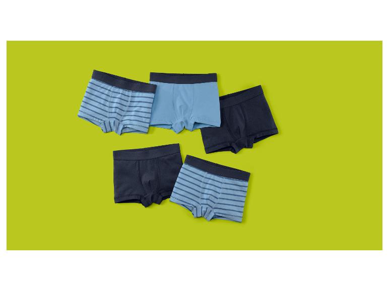Vijf jongensboxershorts in blauwe en donkerblauwe tinten