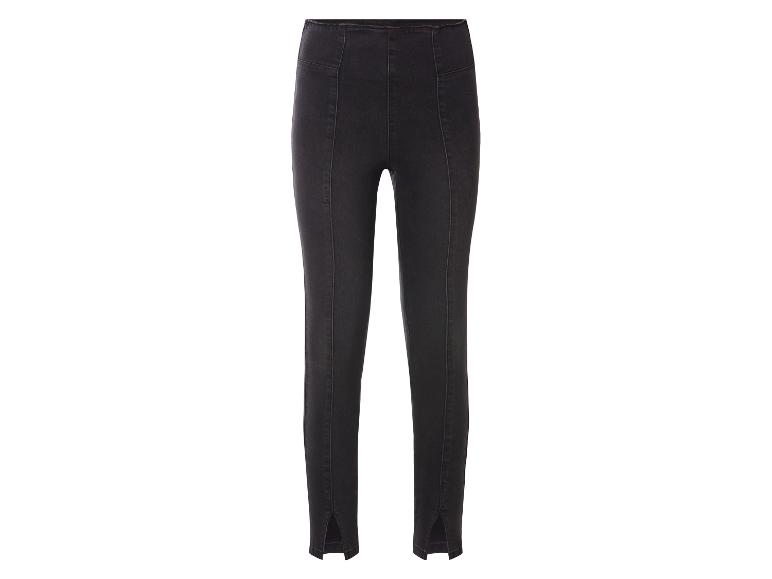 Zwarte skinny jeans met voornaad en splitjes aan de pijpen.